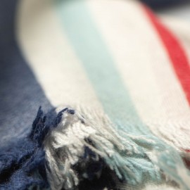 Oversize scarf in off-white with blue and red stripes