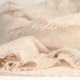 Knitted cashmere scarf in beige